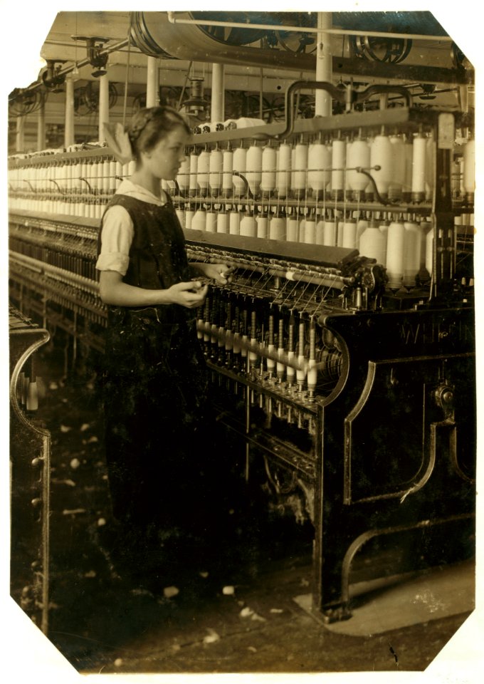 King Philip Spinning Room. Spare hand on spinning frames. Alphonsine Berube, 831 Globe St. Age - 15 years. LOC nclc.03053
