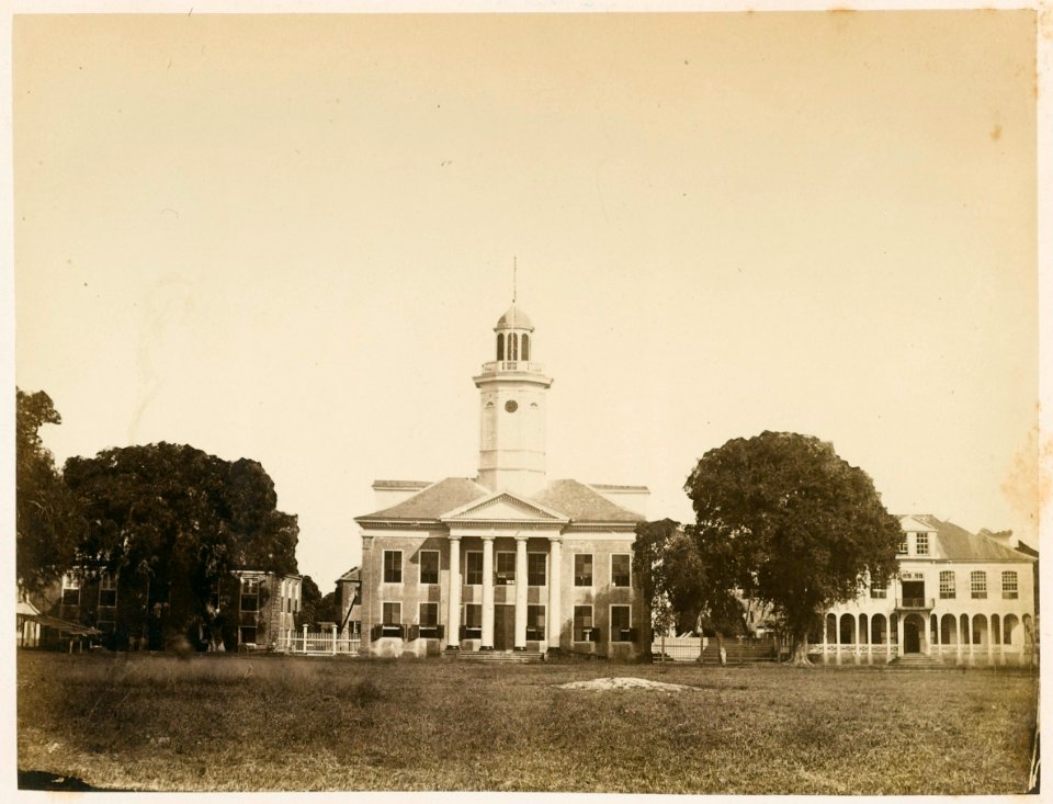 KITLV - 12695 - From left to right- Court of Justice, Administration of Finance and the Secretary at the Government Square in Paramaribo - circa 1890