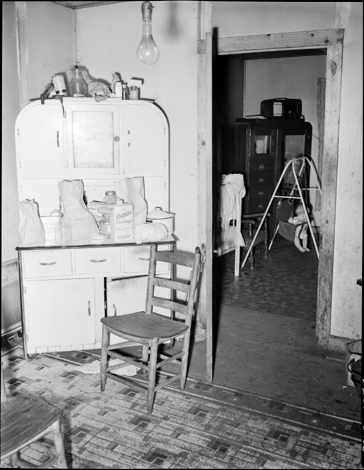 Kitchen in the four room house of the Philip Asbury's. Panther Red Ash Coal Corporation, Douglas Mine, Panther... - NARA - 541010