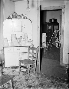Kitchen in the four room house of the Philip Asbury's. Panther Red Ash Coal Corporation, Douglas Mine, Panther... - NARA - 541010