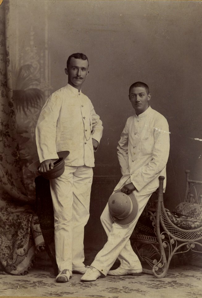 KITLV - 178720 - Stafhell & Kleingrothe - Medan-Deli-Sumatra O.K. - Studio portrait of two men in Medan, Sumatra - circa 1900