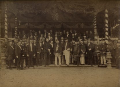 KITLV - 151336 - Lambert & Co., G.R. - Singapore - Sultan of Sambas, Mohammed Sjafiuddin, with his party at his silver jubilee. Beside him assistant resident D.W. Horst and Dr. A. W. Nieuwenhuis - 1891-11-06