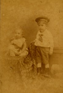 KITLV - 181500 - Lambert & Co, G.R. - Singapore-Deli - Studio portrait of two European children at Singapore or Deli - circa 1890 photo