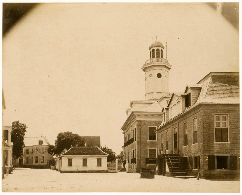 KITLV - 39006 - Muller, Julius Eduard - Paramaribo - Right the back of the Court of Justice and next to it (with tower), the Stone Building (Ministry of Finance) in Paramaribo - circa 1885