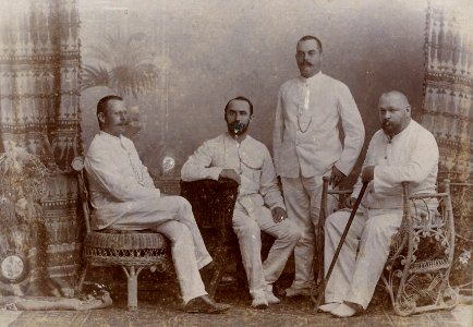 KITLV - 178725 - Stafhell & Kleingrothe - Medan-Deli-Sumatra O.K. - Studio portrait of four European men in Medan, Sumatra - circa 1900