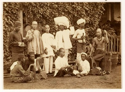 KITLV - 29190 - Ten domestic servants of various ethnic origins, each with an object relating tot their task, Singapore - circa 1900
