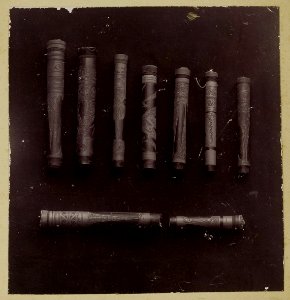 KITLV - 25791 - Demmeni, J. - Bamboo cases with carved decorations by the Kayan on the Upper Mahakam for storing tobacco and small jewelry - 1896-1897