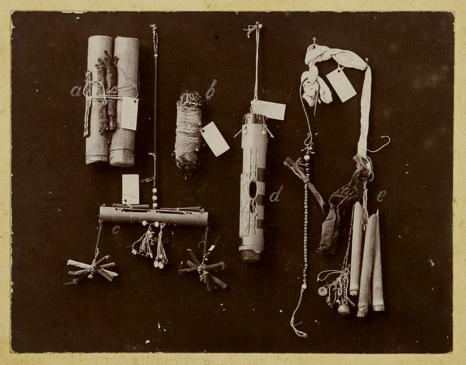 KITLV - 25796 - Demmeni, J. - Objects of worship, held by the Kayans on the Upper Mahakam. From left to right Tekok, Usu Bruwa, Bowo Nangan, Telu hina, Tawu Nangan - 1896-1897