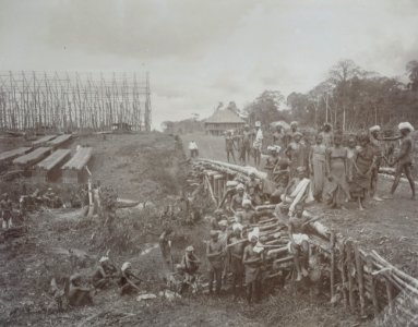KITLV - 86779 - Stafhell & Kleingrothe - Medan-Deli - Workers at a drying barn under construction at a plantation in Deli - circa 1900
