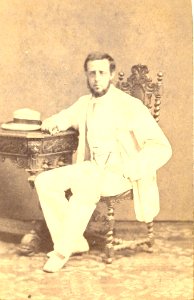 KITLV - 43187 - Guicherit, Photographe R. - Paramaribo - Constant Wesenhage, lawyer at Paramaribo, with both arms leaning on a table - 1870