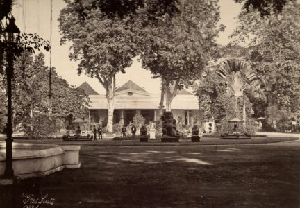 KITLV 103218 - Kassian Céphas - Resident Property at Yogyakarta. In the garden a variety of Javanese Hindu and Buddhist sculptures - Around 1895 photo