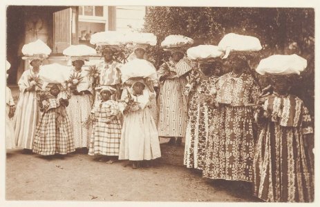 KITLV - 5359 - Women in kotomisi attire a Creole festival in Surinam - circa 1900