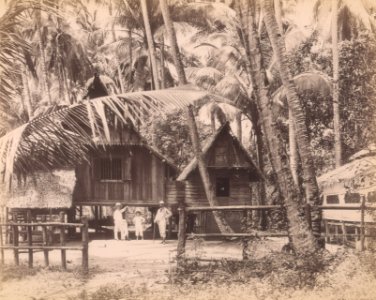 KITLV - 91761 - Lambert & Co., G.R. - Singapore - Europeans in front of a house in a village in the Straits Settlements - circa 1890