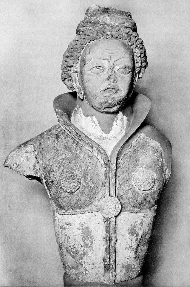 Kizil statue of a man in armour