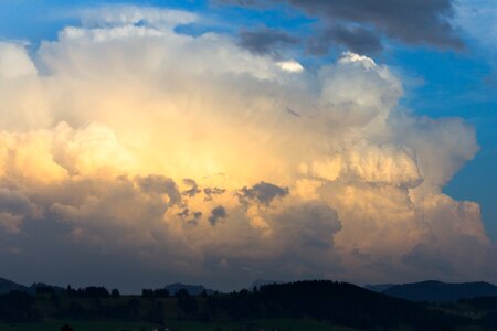 Golden hour cumulonimbus storm hunting photo
