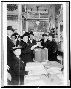 Labor leader a voter-Samuel Gompers, president of the American Federation of Labor, casting his ballot in his home district LCCN97506416