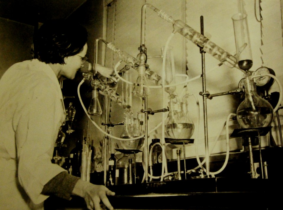 Laboratory chemist tests purity of gelatin used for such vitamin capsules, WWII (22573376628)