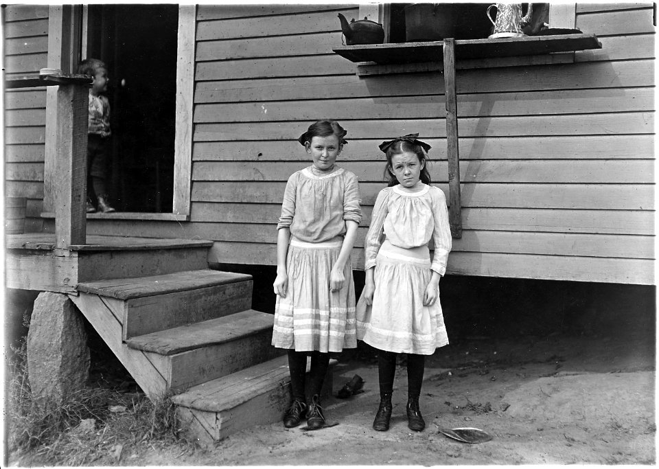 Lacy (12 years old) and Savannah ( 11 years old) Ballard. Have worked two years. Father said, the little one is a... - NARA - 523103