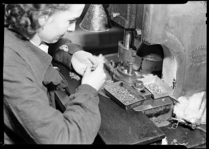 Lancaster, Pennsylvania - Hamilton Watch. Operation - click - simple machine operation for removing excess material... - NARA - 518426