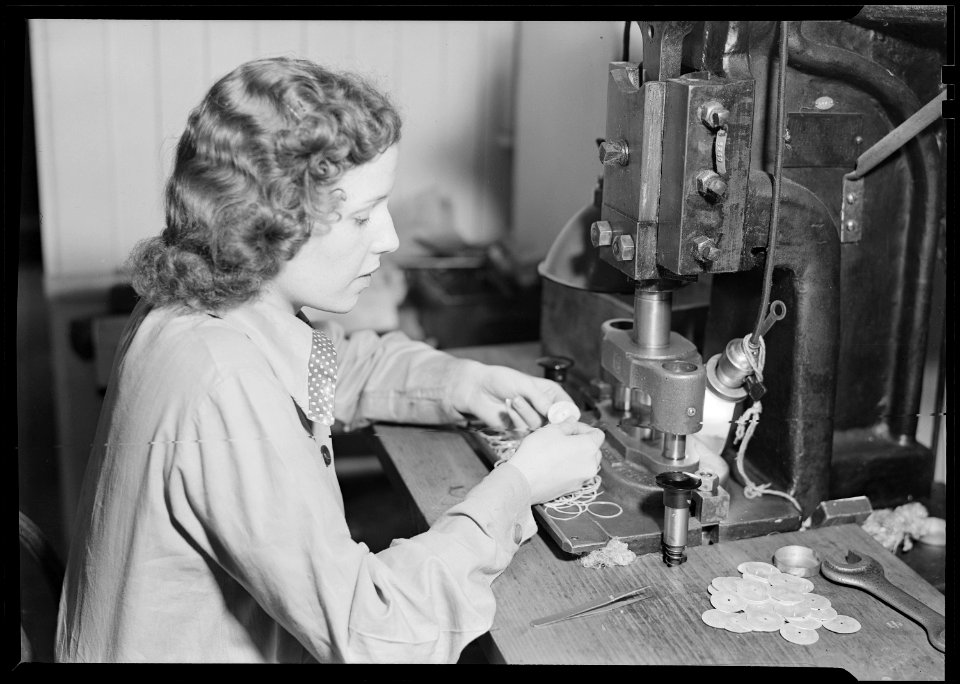 Lancaster, Pennsylvania - Hamilton Watch. Operation - shaving dial blank - simple machine operation (note two safety... - NARA - 518424
