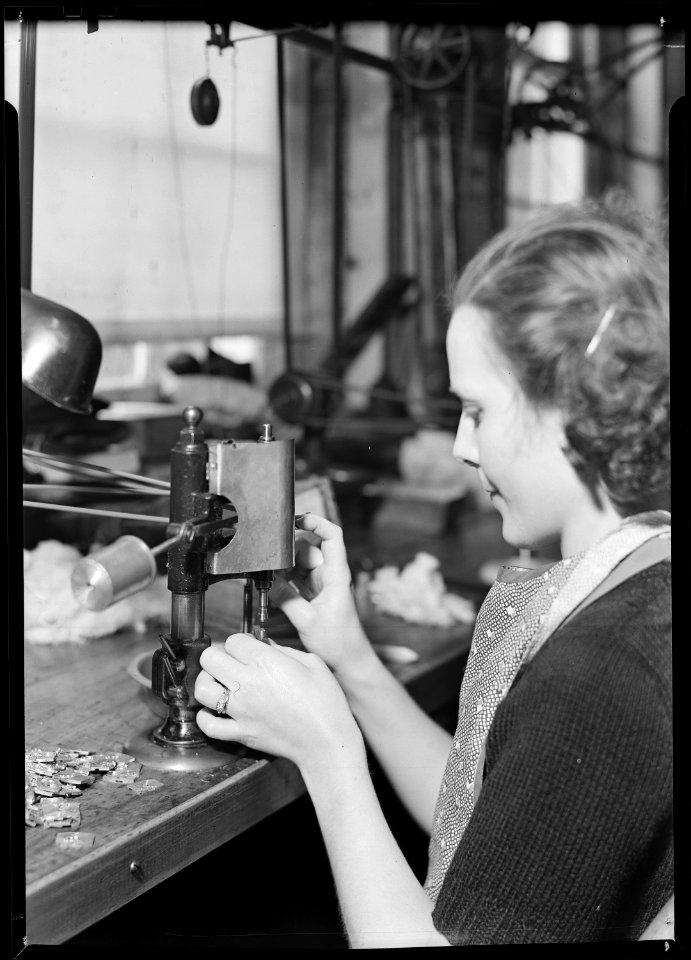 Lancaster, Pennsylvania - Hamilton Watch . Operation - tapping dial foot - simple operation for threading holes in... - NARA - 518428