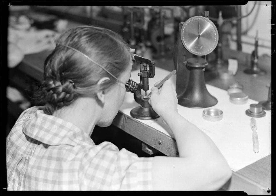 Lancaster, Pennsylvania - Hamilton Watch. Operation - rectifying wheels - semi-skilled machine operation by which any... - NARA - 518435