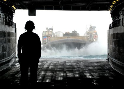 Landing craft approaches USS Green Bay 121123-N-BB534-392