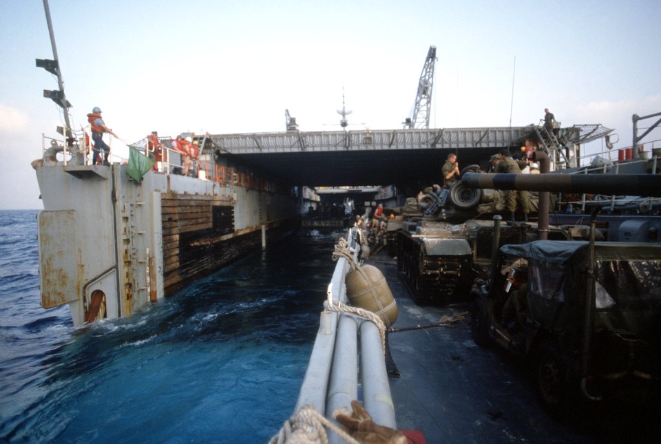 Landing craft leaves well deck of USS Pensacola (LSD-38) in 1985