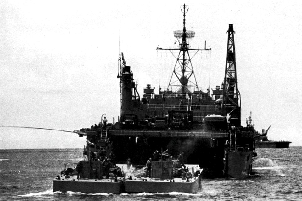 Landing craft approaching USS Pensacola (LSD-38) in the Mediterranean Sea, in 1975