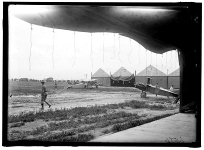LANGLEY FIELD, VA. HANGERS- PLANES, LEFT TO RIGHT- CURTISS JN4D, AND KIRKHAM TRIPLANE LCCN2016868203