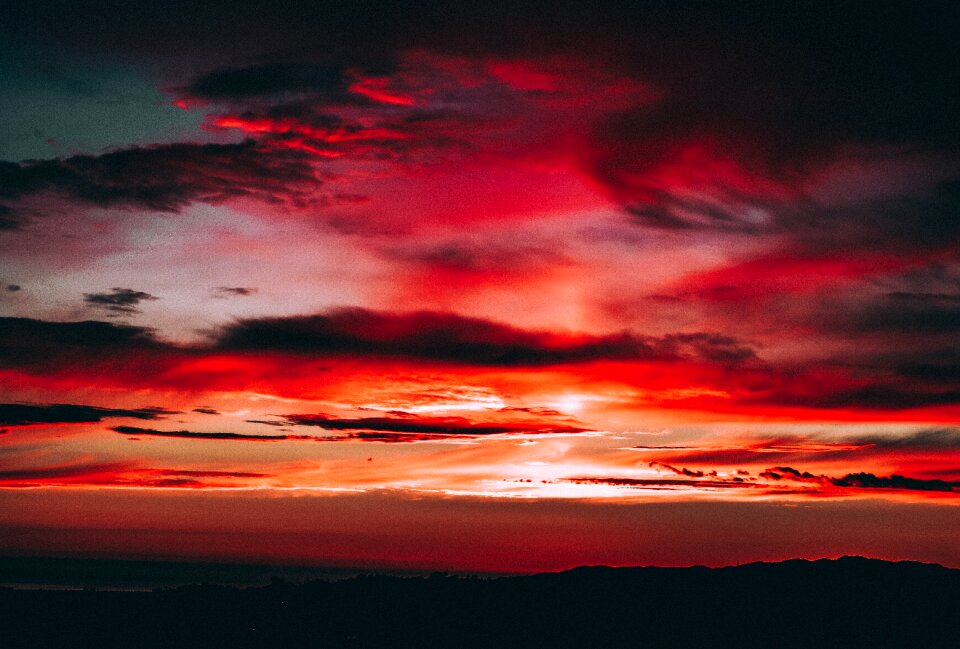 Dark sunset mountain photo