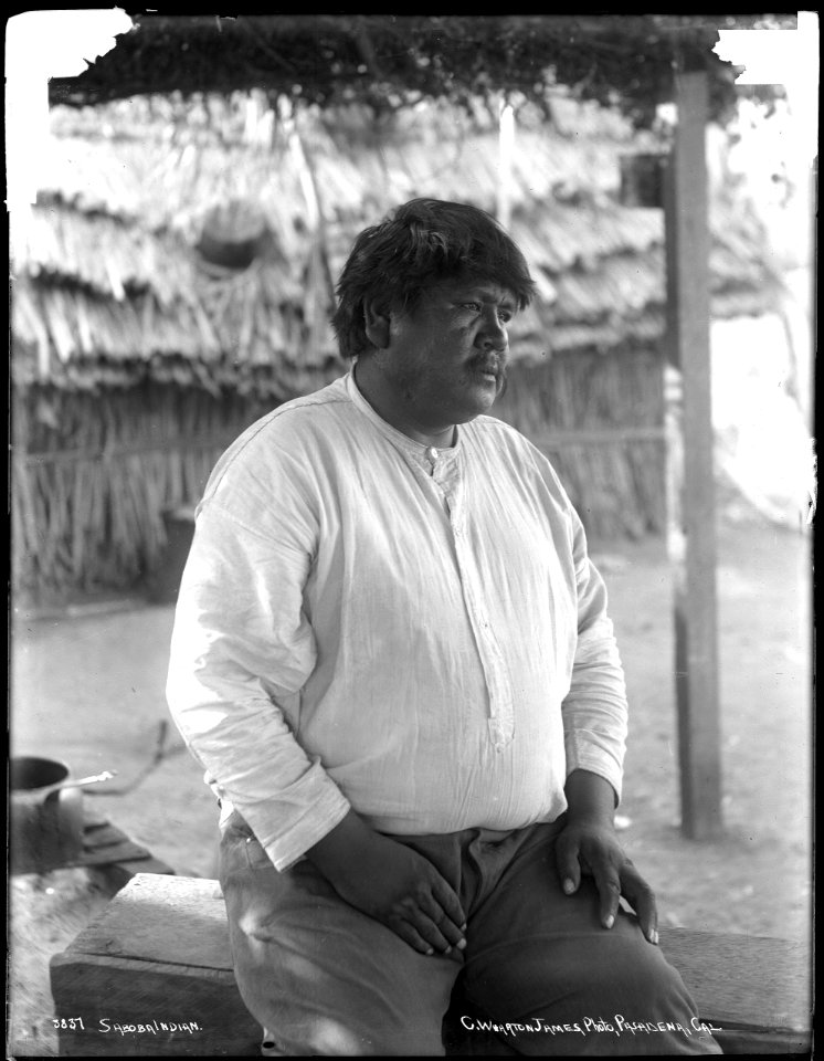 Large Soboba Indian man sitting outside, ca.1900 (CHS-3837)