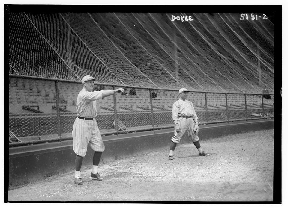 Larry Doyle at left, throwing ball, New York NL (baseball) LCCN2014710549
