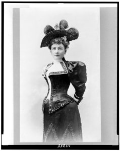 Laura Jean Libbey, three-quarter length portrait, standing, facing slightly left LCCN94508914