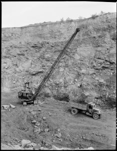 Large steam shovel used in stripping operation. Overburden is about 100 ft. thick. Coal seam is exposed here and... - NARA - 541523 photo