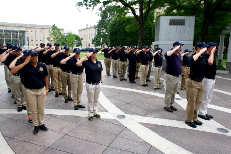 Law Enforcement Explorers salute while hosted by U.S. Marshals photo