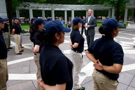 Law enforcement explorers stand in formation observing wreath 2