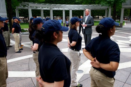 Law enforcement explorers stand in formation observing wreath 2 photo