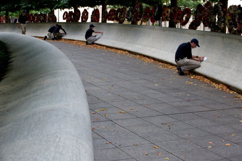 Law enforcement explorer traces names at the National Law Enforcement Officers Memorial 3