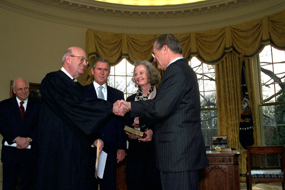 Laurence Silberman congratulates Donald Rumsfeld
