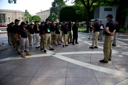 Law enforcement explorers stand at attention at the National Law Enforcement Officers Memorial