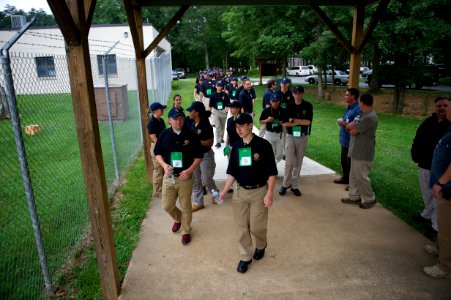 Law enforcement explorers standing around wearing nametags