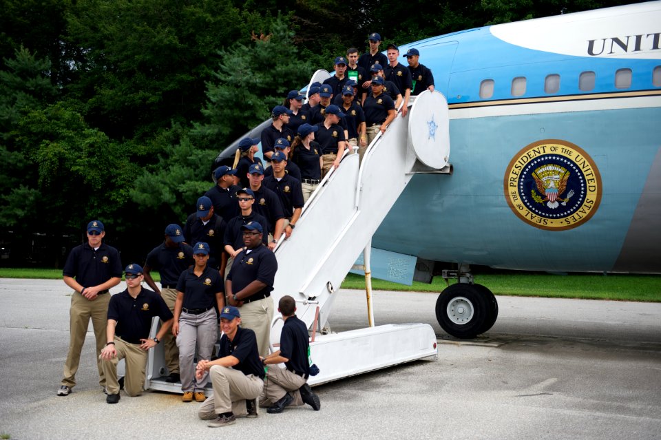Law enforcement explorers aboard stairs to plane 2