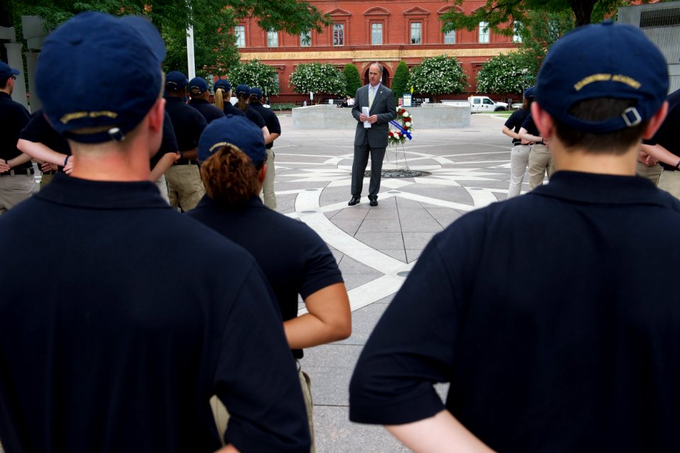 Law enforcement explorers stand in formation observing wreath 3