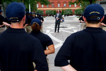 Law enforcement explorers stand in formation observing wreath 3 photo