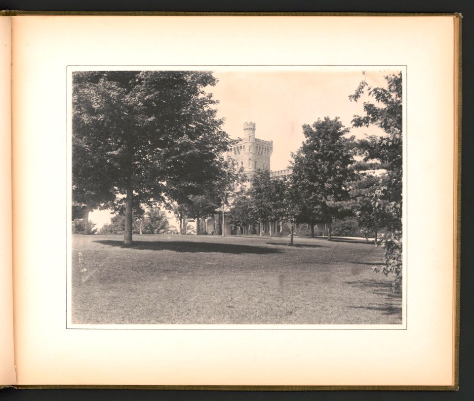 Lawn with trees obscuring mansion at Ophir Farm, home of Elisabeth and Whitelaw Reid, Purchase, New York LCCN2016650182