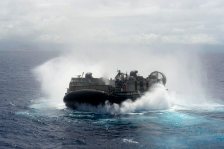 LCAC departs USS Rushmore 140713-N-UD469-333