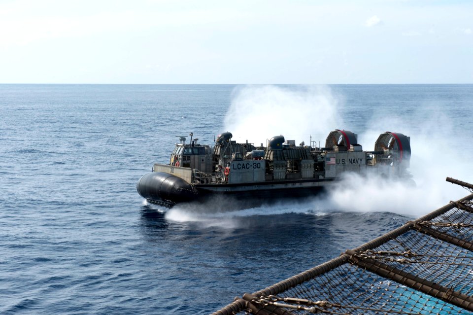 LCAC 30 departs well deck 141002-N-UD469-033