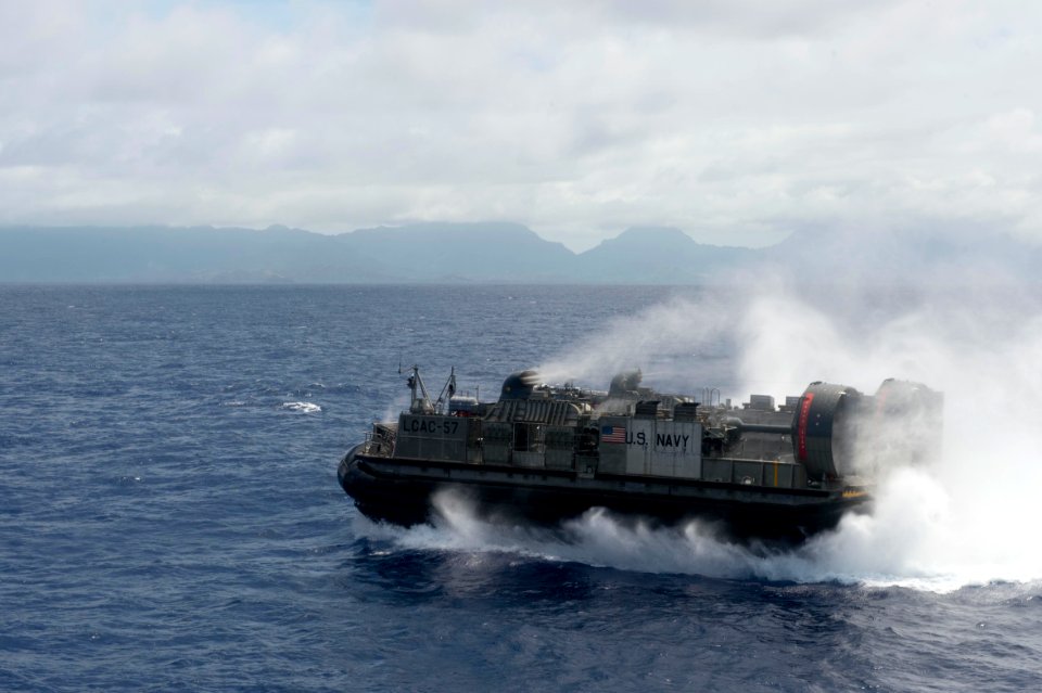 LCAC departs USS Rushmore 140713-N-UD469-379