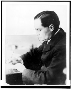 Learned Hand, half-length portrait, seated at desk, facing left LCCN95521140